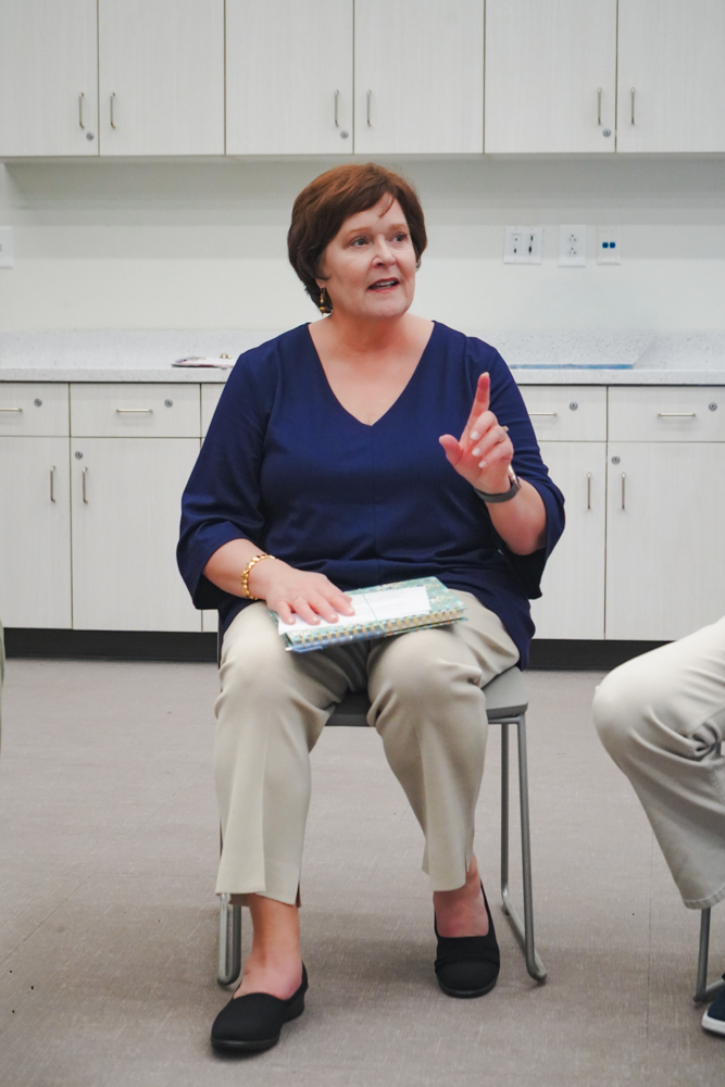 Char Fitzwater speaking at a community listening session